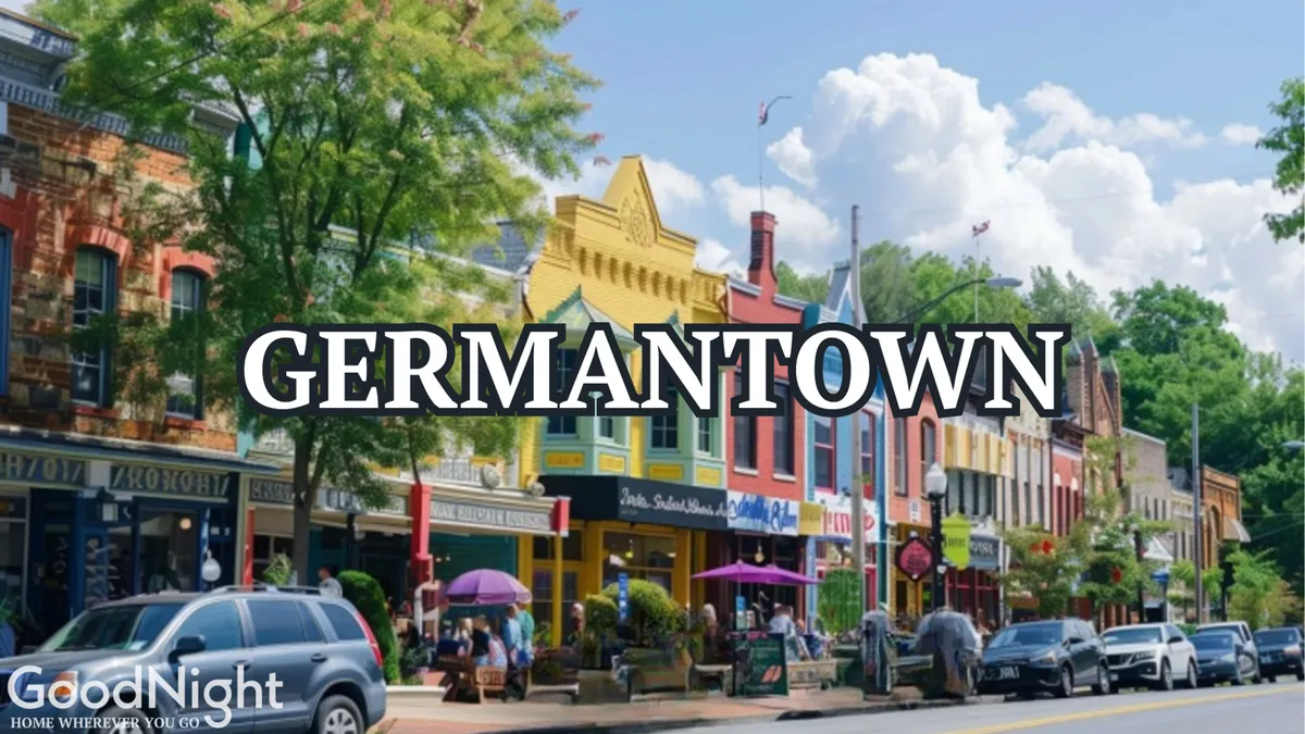 A cheerful streetscape with colorful storefronts, outdoor dining, and people enjoying a sunny day under green trees and blue sky. The ambiance is welcoming, suggesting a thriving local food and shopping scene.